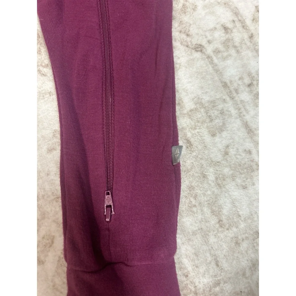 Kyte Baby Bamboo Jersey Hooded Zippered Romper in the color Dahlia